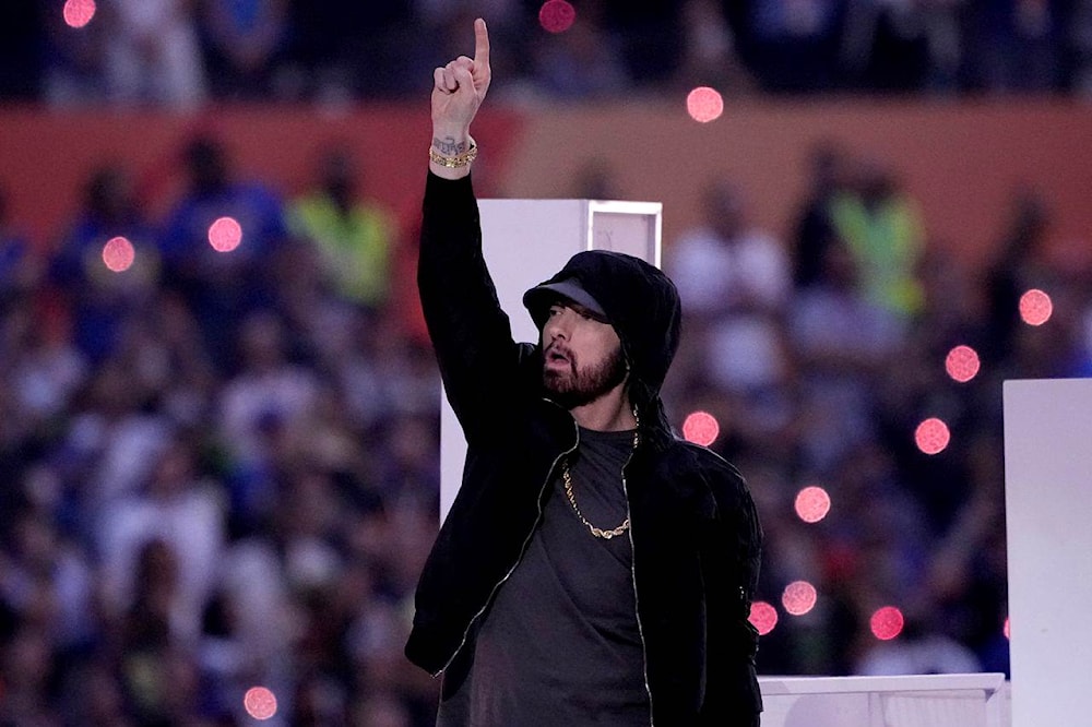 Eminem kneels during Super bowl half time performance | Al Mayadeen English