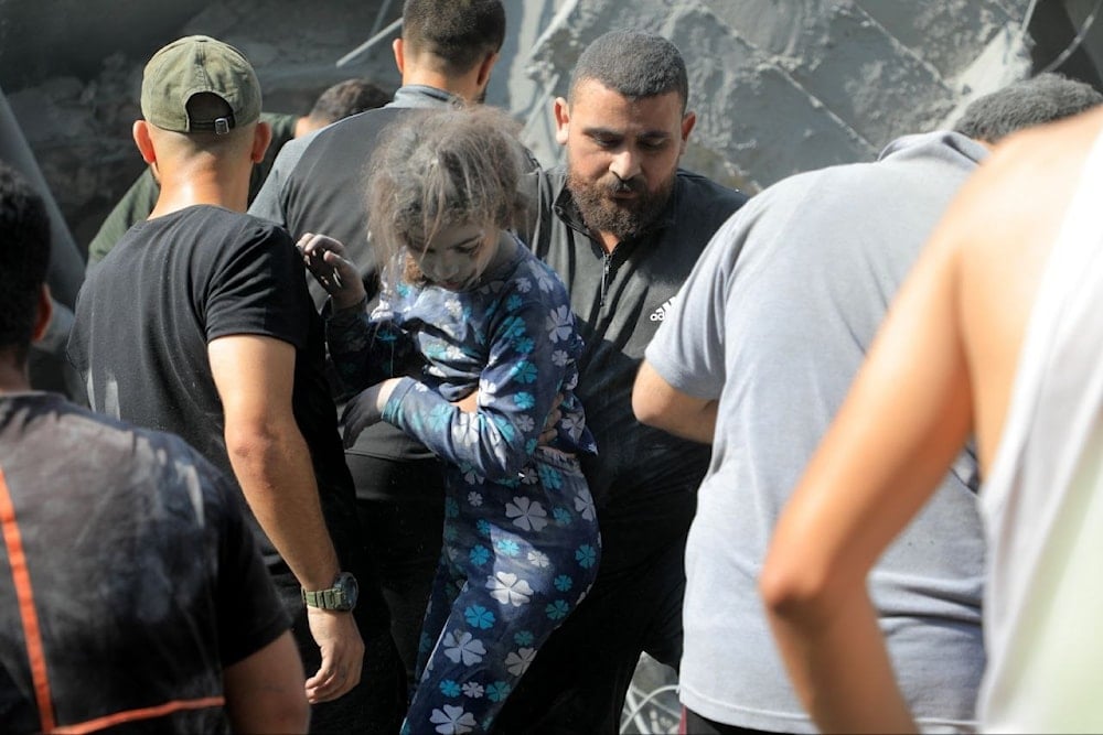 . A little child pulled from under the rubble in the wake of the Israeli massacre in in the Jabalia refugee camp, north of the #Gaza Strip on October 31, 2023. (Twitter)