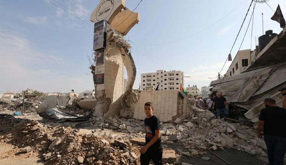 A Palestinian boy surveys the massive destruction following the Israeli military's raid in Jenin. ( AFP)