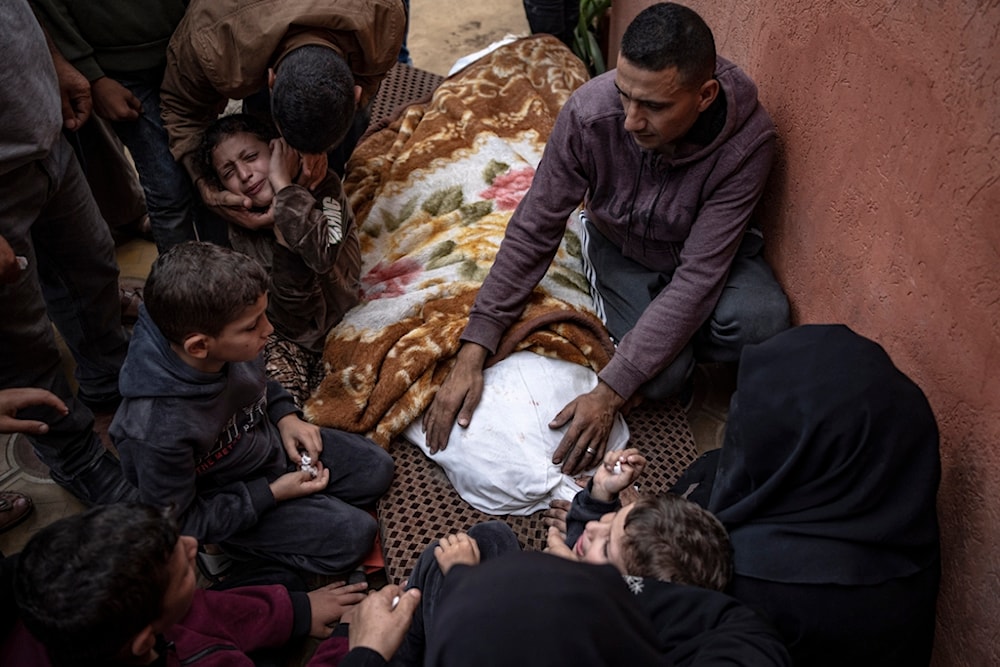 Palestinians mourn their relatives killed in the Israeli bombardment of the Gaza Strip, in the hospital in Khan Younis, November 11, 2023 (AP)