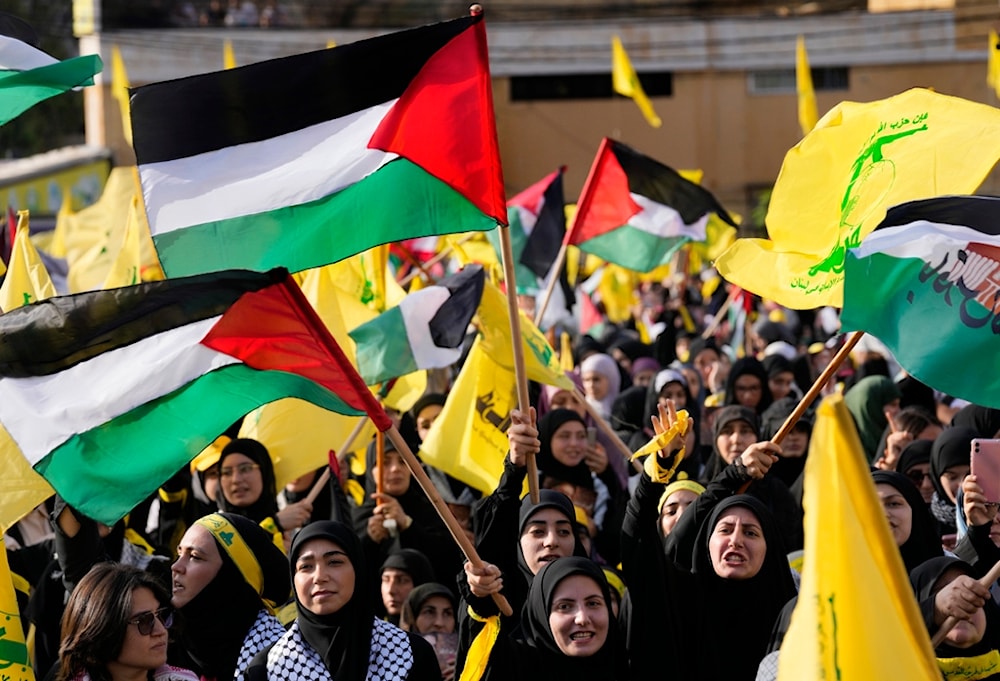 Hezbollah supporters during a rally to commemorate Hezbollah fighters martyred in South Lebanon last few weeks while fighting against the Israeli occupation forces, in Beirut, Lebanon, November 3, 2023 (AP)