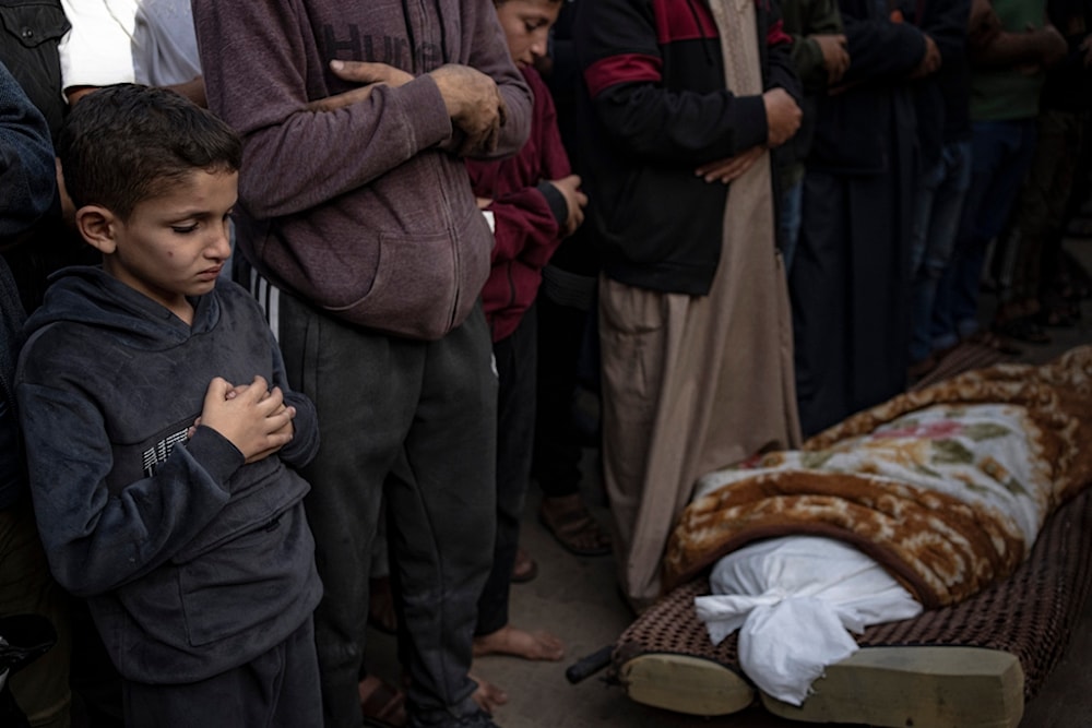 Palestinians mourn their relatives killed in the Israeli bombardment of the Gaza Strip, in the hospital in Khan Younis, Saturday, Nov. 11, 2023. ( AP Photo/Fatima Shbair)