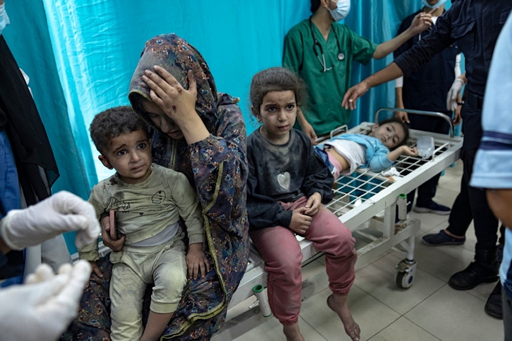 Palestinians wounded in Israeli bombardment of the Gaza Strip are brought to a hospital in Khan Younis, Southern Gaza, Palestine, Sunday, Nov. 12, 2023 ( AP Photo/Fatima Shbair)