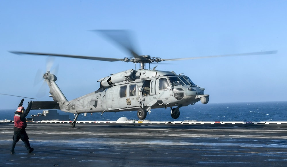 An MH-60S Knighthawk, assigned to the ‘Eightballers’ of Helicopter Sea Combat Squadron (HSC) 8, takes off from the flight deck of the aircraft carrier USS Theodore Roosevelt (CVN-71) on May 20, 2021 (US Navy Photo)