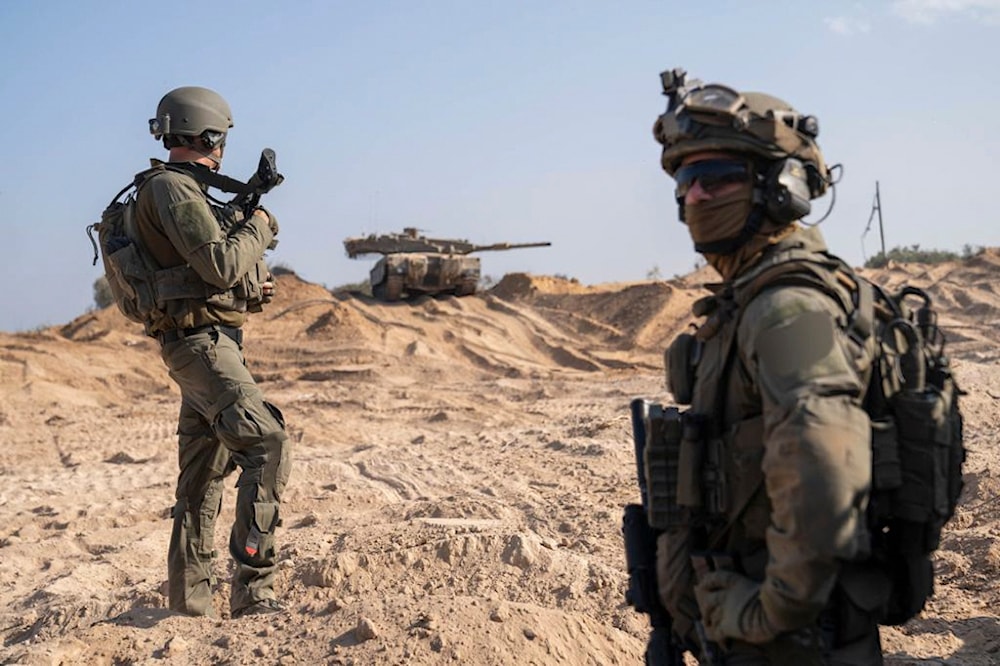 IOF troops stationed near the Gaza Strip on November 2, 2023. (AP)