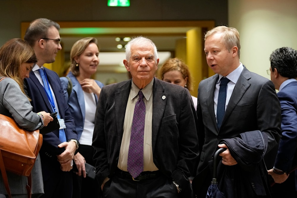 EU foreign policy chief Josep Borrell, center, arrives for a meeting of EU foreign ministers at the European Council building in Brussels, Monday, Nov. 13, 2023. (AP Photo/Virginia Mayo)