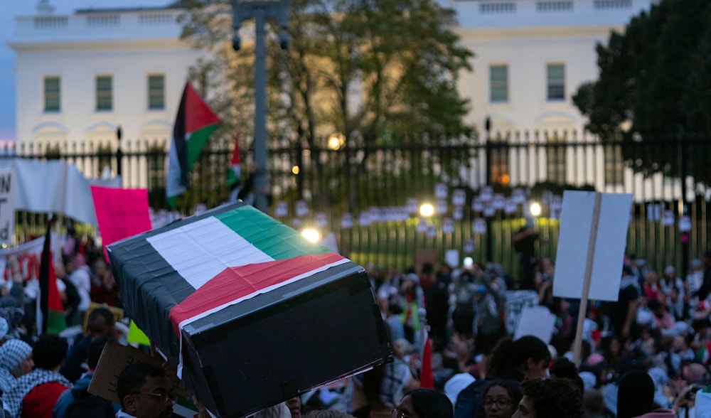 Anti-war activists carrying a mock coffin protest outside of the White House during a pro-Palestinian demonstration asking for a cease fire in Gaza in Washington, Nov. 4, 2023. (AP)