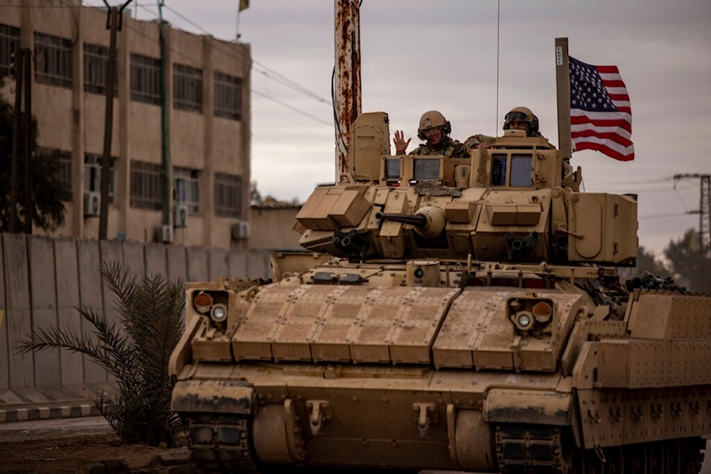 US occupation soldiers patrol in Hassakeh, Syria, Tuesday, Feb. 8, 2022. (AP)