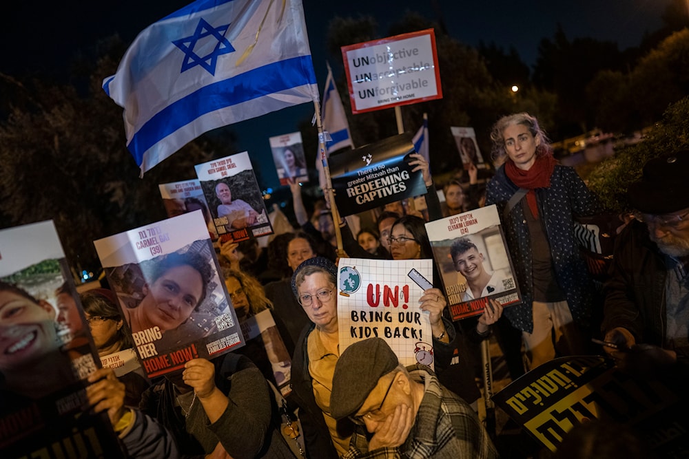 People gather outside UN headquarters in Jerusalem to call for the return of the hostages kidnapped during the Oct. 7 Operation Al-Aqsa Flood in Israel, Monday, Nov. 13, 2023. (AP)
