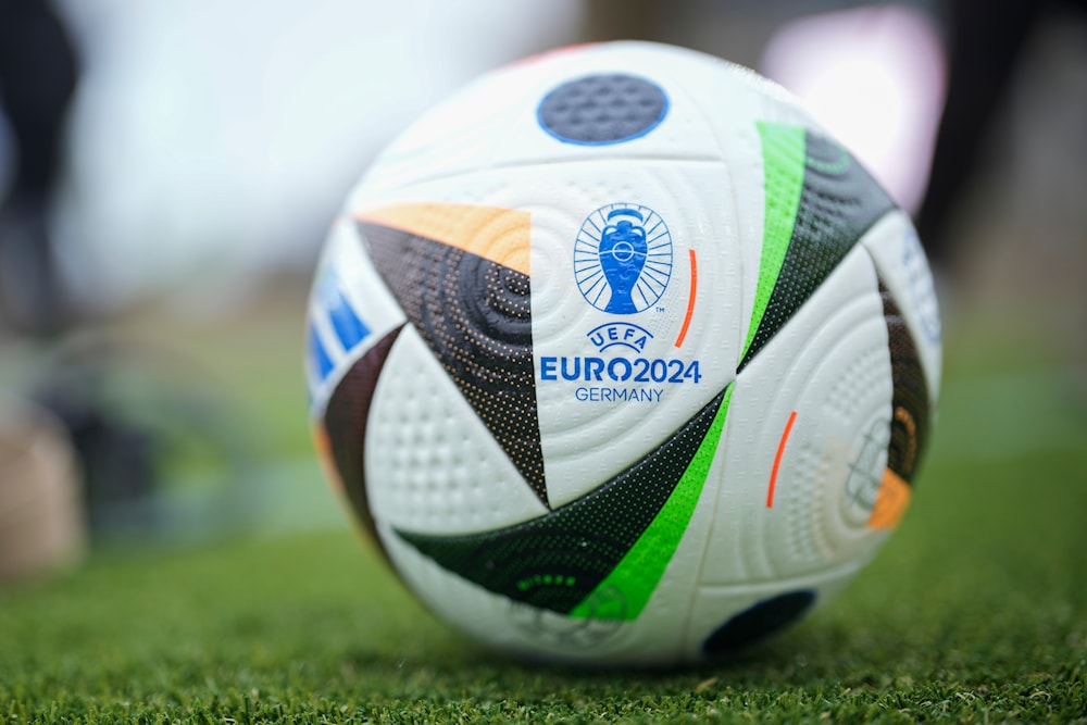 A UEFA Euro 2024 Ball lays on the ground during a presentation of the new ball in Berlin, Germany, Nov. 15, 2023 (AP)