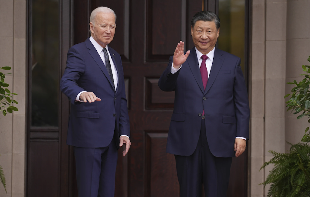 Biden, Xi vow to reduce tensions at key summit