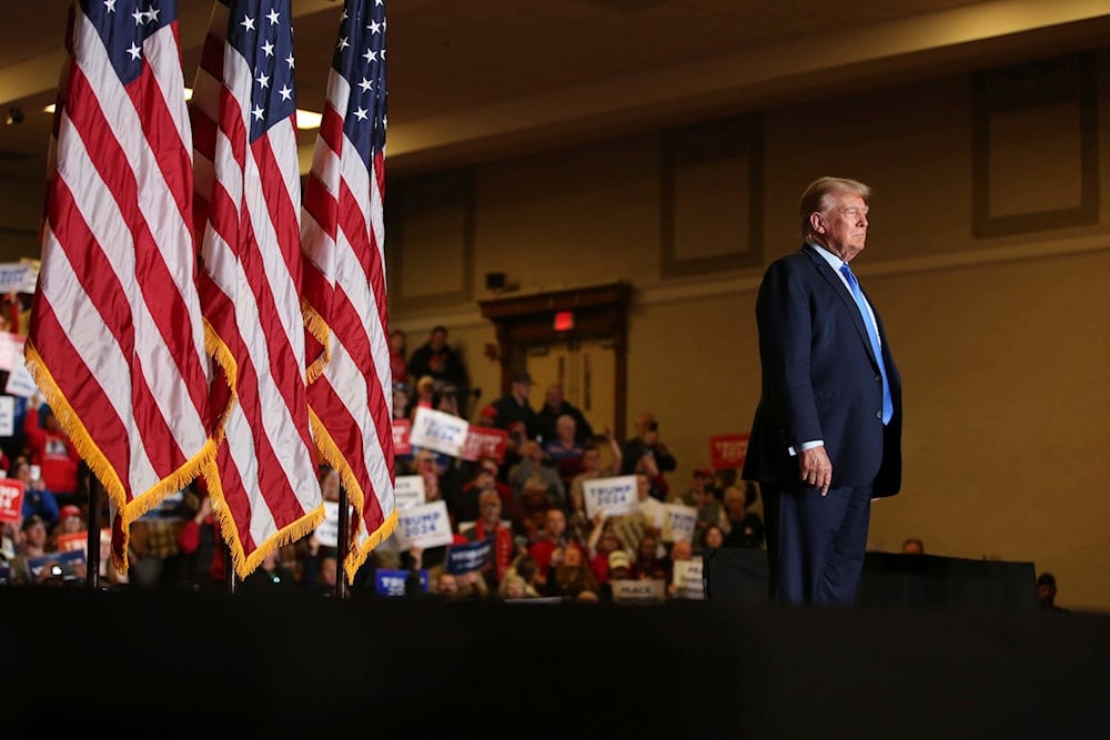 Former President Donald Trump waves to the crowd at a campaign rally on Nov. 11, 2023, in Claremont, New Hampshire. (AP)