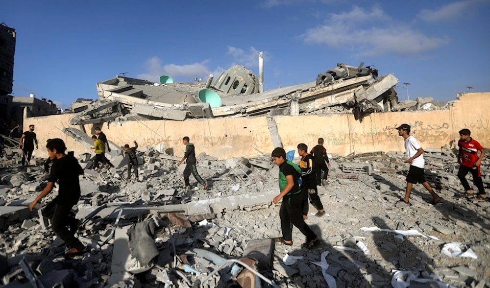 Palestinians inspect the damage of a destroyed mosque following an Israeli occupation strike in Khan Younis refugee camp, southern Gaza Strip on Nov. 8, 2023. (AP)