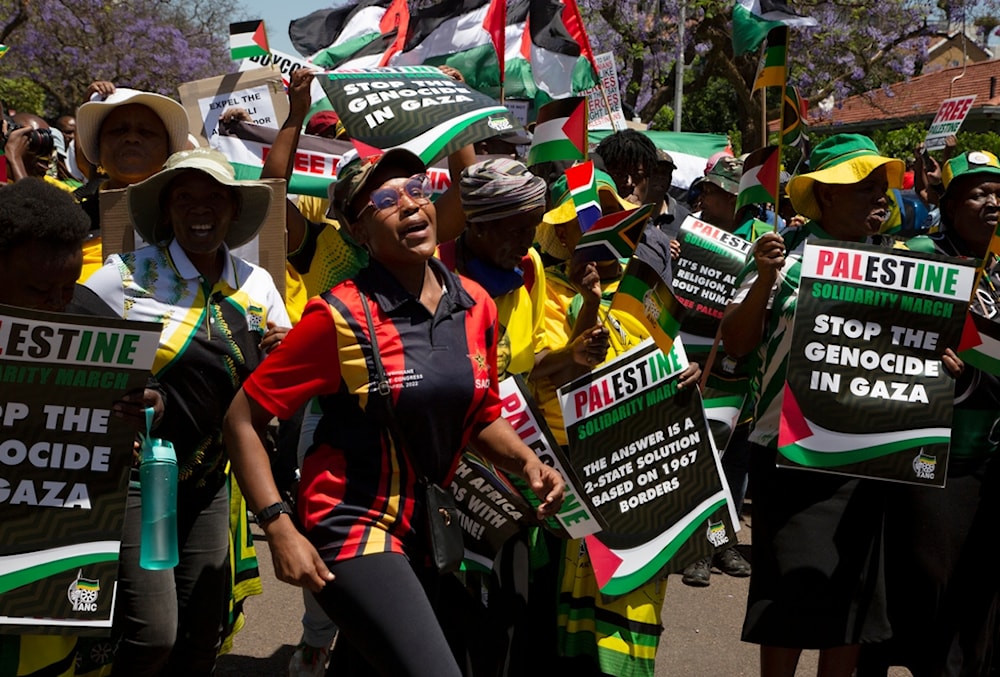 Pro-Palestinian supporters demonstrate at the entrance to the Israeli embassy in Pretoria, South Africa, on Oct. 20, 2023. (AP)