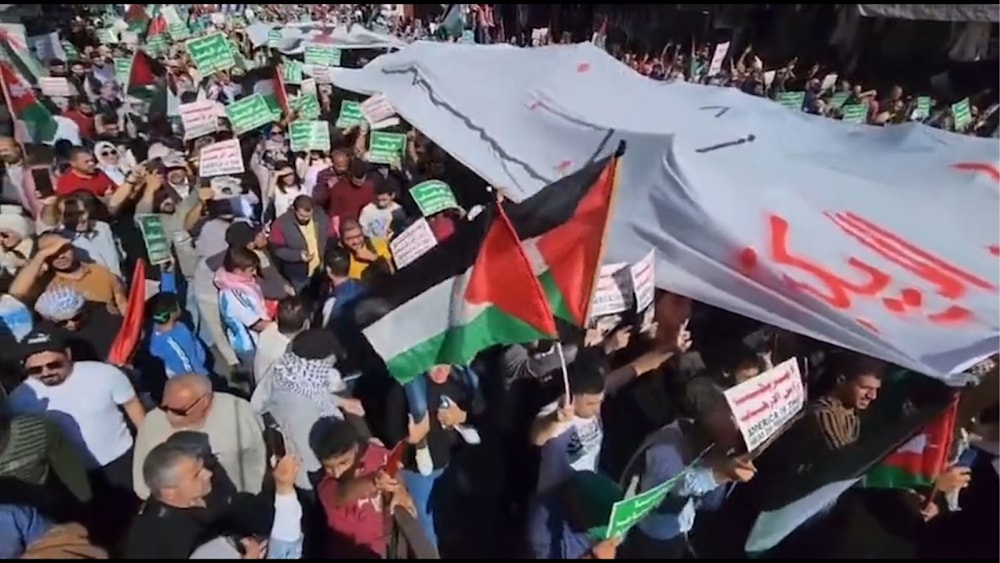 A screen grab from a video posted on social media depicting a pro-Palestine protest in Amman, Jordan (Social Media)