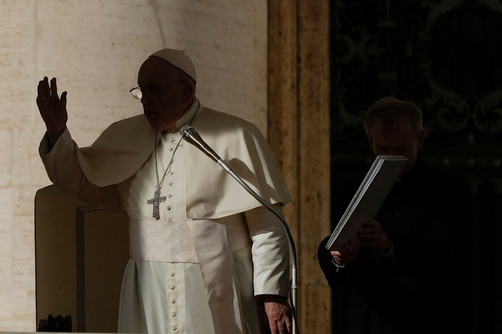 Pope Francis delivers a blessing during the weekly general audience in St. Peter's Square, at the Vatican, Wednesday, Nov. 15, 2023. (AP)