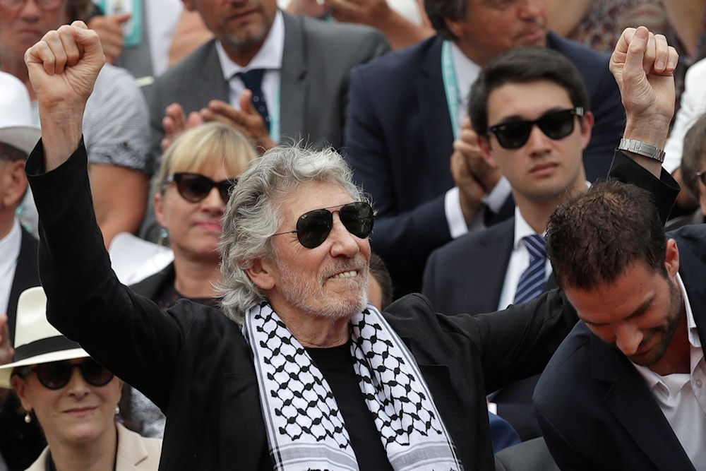 British musician and member of the Pink Floyd band Roger Waters presents the trophy of the men's final match of the French Open tennis tournament in Paris, France on June 10, 2018. (AP)