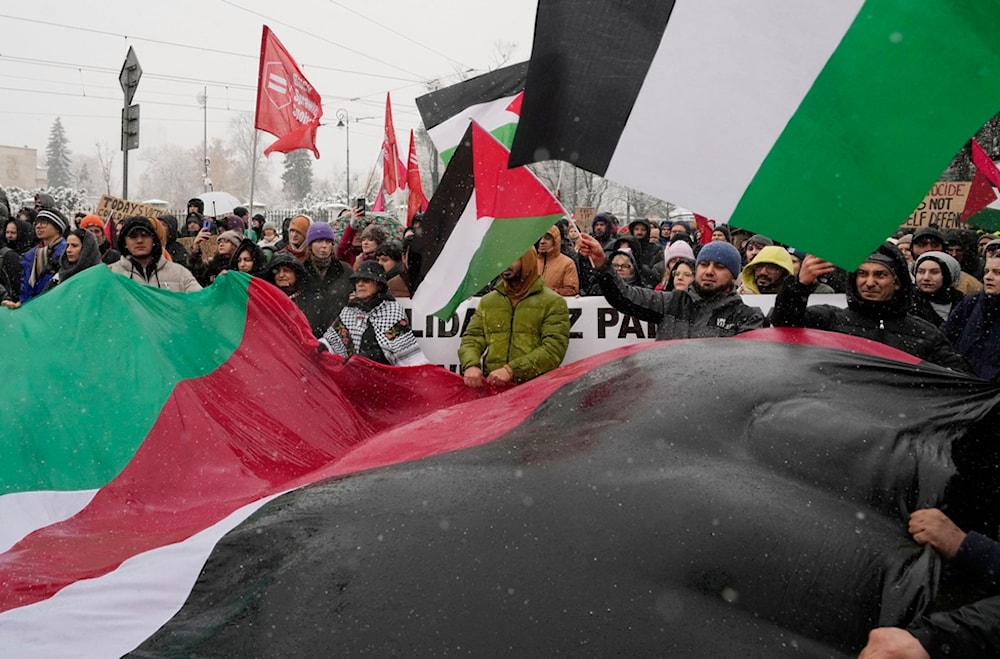 Palestinians and Poles take part in a pro-Palestinian rally in Warsaw, Poland, Saturday Nov. 18, 2023. (AP Photo/Czarek Sokolowski)