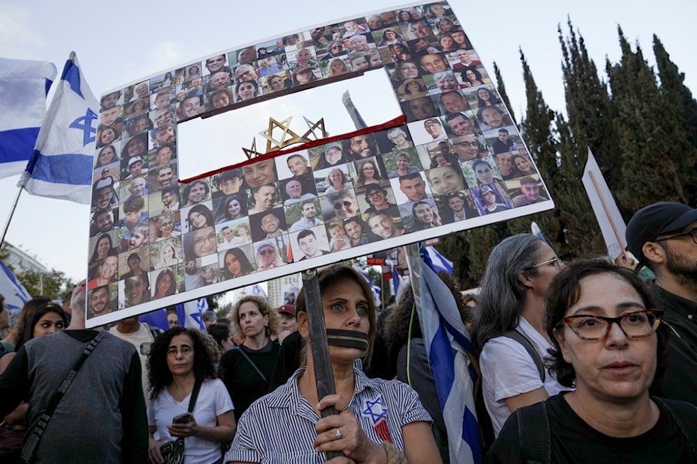 Family and supporters of the captives taken by the Resistance in Gaza complete the final leg of a five-day solidarity rally calling for their return, from 'Tel Aviv' to occupied Al-Quds, occupied Palestine, November 18, 2023 (AP)