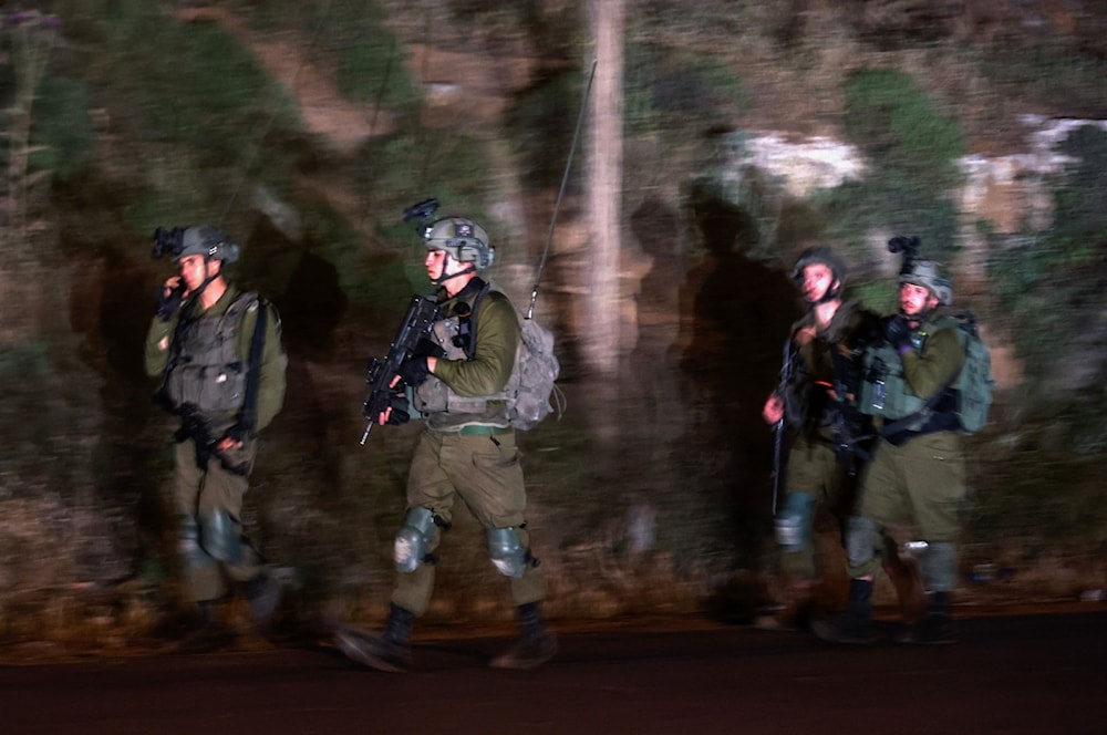  Israeli soldiers leave after a raid at the Balata refugee camp in the occupied West Bank city of Nablus, Palestine, May 22, 2023. (AFP)