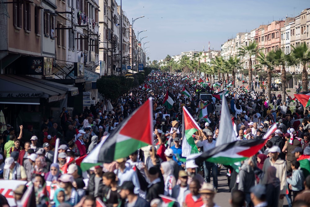 Thousands of Moroccans take part in a demonstration in solidarity with Palestinians in Gaza and against normalization with 