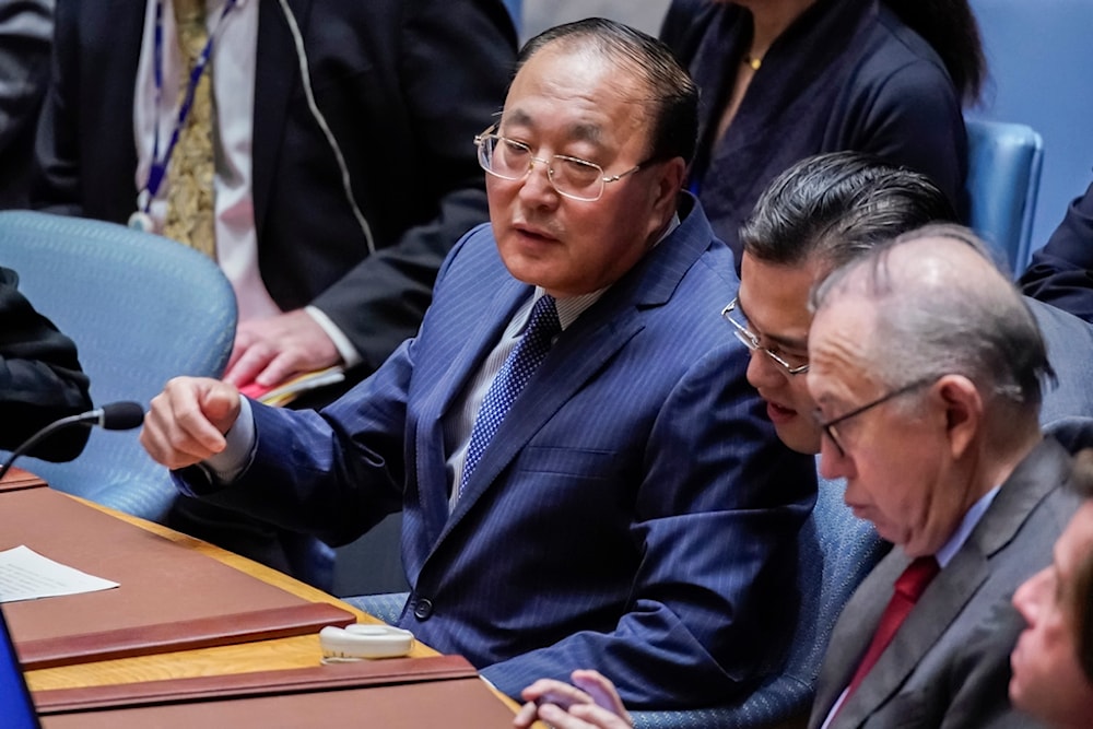 Zhang Jun, China's ambassador to the United Nations, left, attends the U.N. Security Council at United Nations headquarters Monday, Oct. 30, 2023 (AP Photo/Eduardo Munoz Alvarez)