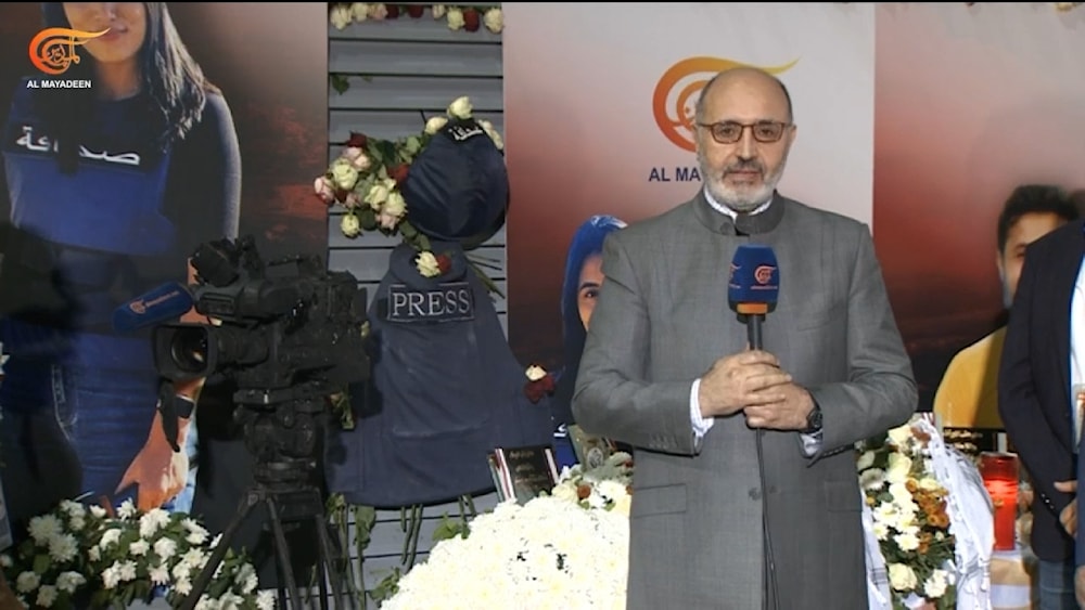 The Chairman of the board of directors of Al Mayadeen, Ghassan Ben Jeddou, stands next to Rabih Me'mari's camera damaged by the very Israeli missile that martyred him, Beirut Lebanon, November 23, 2023