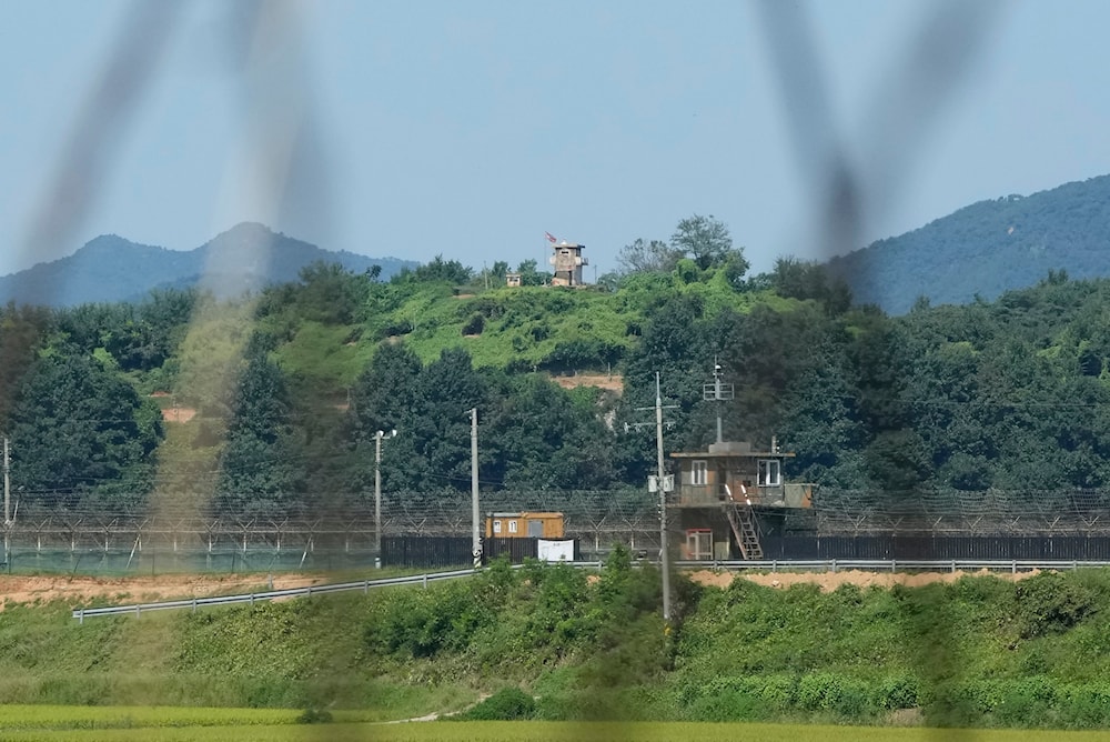 A North Korean military guard post, upper middle, and South Korean post, bottom, are seen South Korea, near the border with North Korea, on Sept. 8, 2023 (AP)