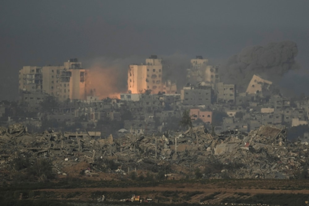 An explosion is seen following an Israeli airstrike in the Gaza Strip, as seen from southern Israel, Thursday, Nov. 23, 2023. (AP Photo/Leo Correa)