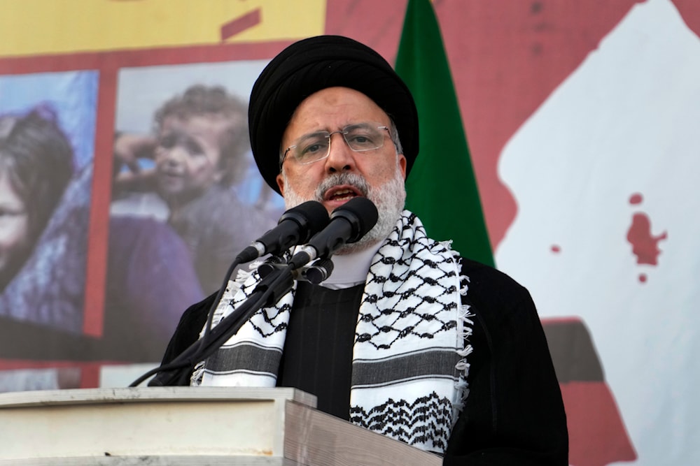 Iranian President Ebrahim Raisi speaks during an anti-Israel rally at Enqelab-e-Eslami (Islamic Revolution) Sq. in Tehran, Iran, Wednesday, Oct. 18, 2023. (AP)