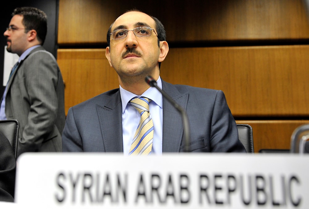 Syrian Ambassador to the International Atomic Energy Agency, IAEA, Bassam Al-Sabbagh waits for the start of the IAEA board of governors meeting at the International Center in Vienna, Austria, Wednesday, Sept. 11, 2013.  (AP)