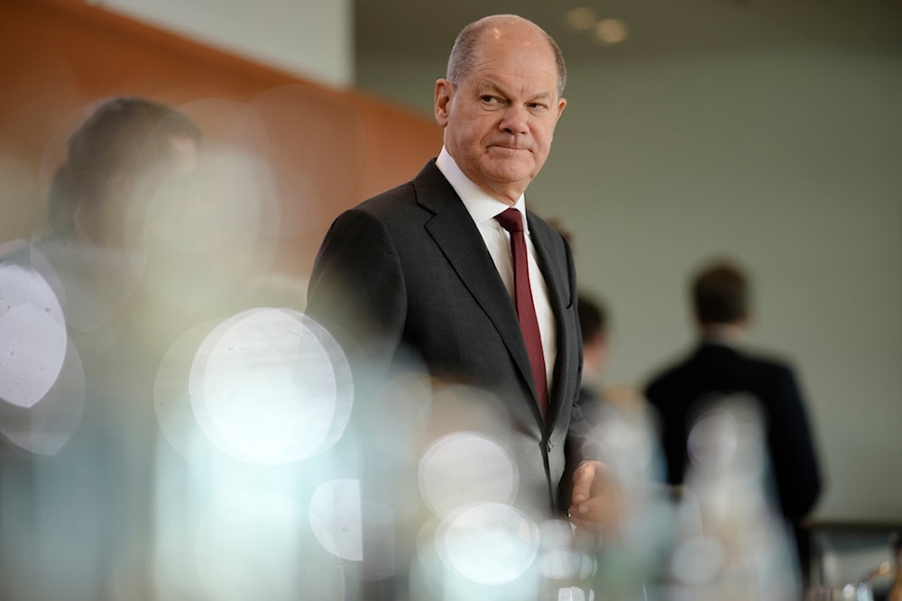 German Chancellor Olaf Scholz arrives for the cabinet meeting at the chancellery in Berlin, Germany, Wednesday, Nov. 22, 2023. (AP Photo/Markus Schreiber)
