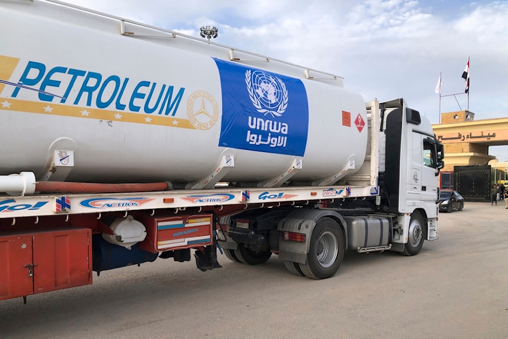 An Egyptian truck delivering fuel to the Gaza Strip waits to cross the Rafah border crossing between the Gaza Strip and Egypt, in Rafah, Egypt, Wednesday, Nov.22, 2023. (AP)