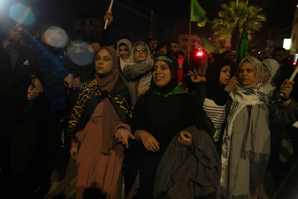 Former Palestinian female prisoners who were released by the Israeli occupation regime, are received by supporters upon their arrival in the town of Beitunia, occupied Palestine, Friday, Nov. 24, 2023 (AP Photo/Nasser Nasser)