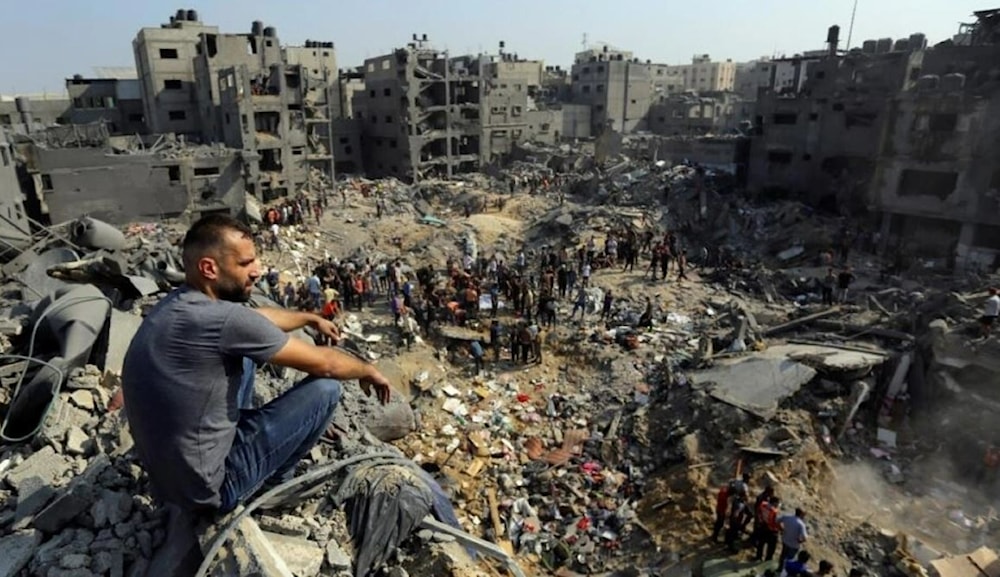 A Gazan surveys the destruction after Israeli airstrikes in the Jabalia refugee camp in northern Gaza on November 1, 2023. (AP)
