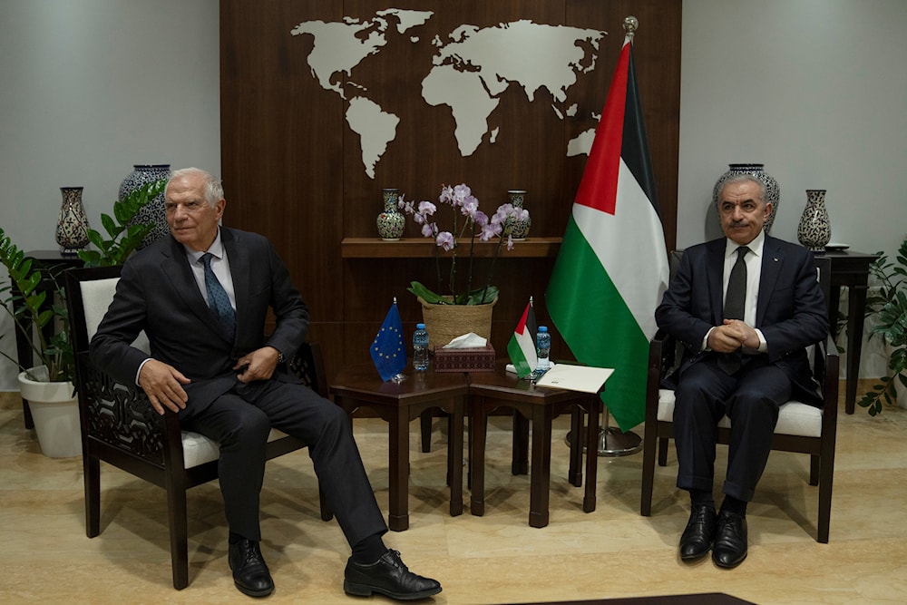 Palestinian Prime Minister Mohammad Shtayyeh, right receives European Union's foreign policy chief Josep Borrell, at his office in the West Bank city of Ramallah, Friday, Nov. 17, 2023. (AP)