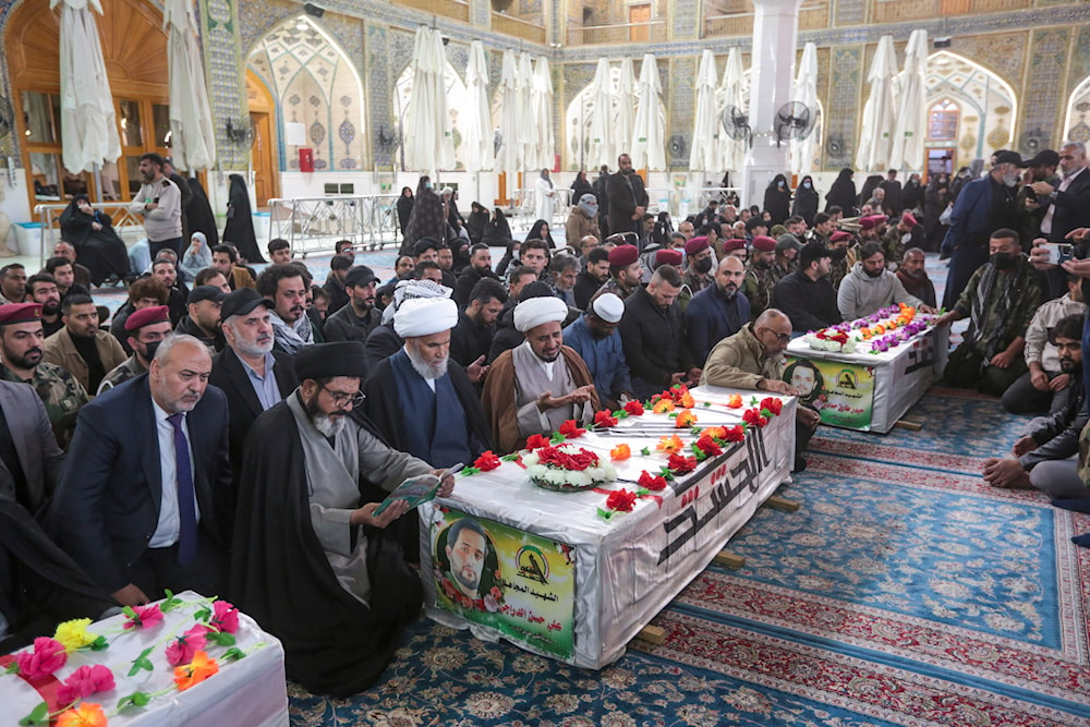 Iraqis attend the funeral of the Kataib Hezbollah members in Najaf, Iraq, Wednesday, Nov 22, 2023 (AP)