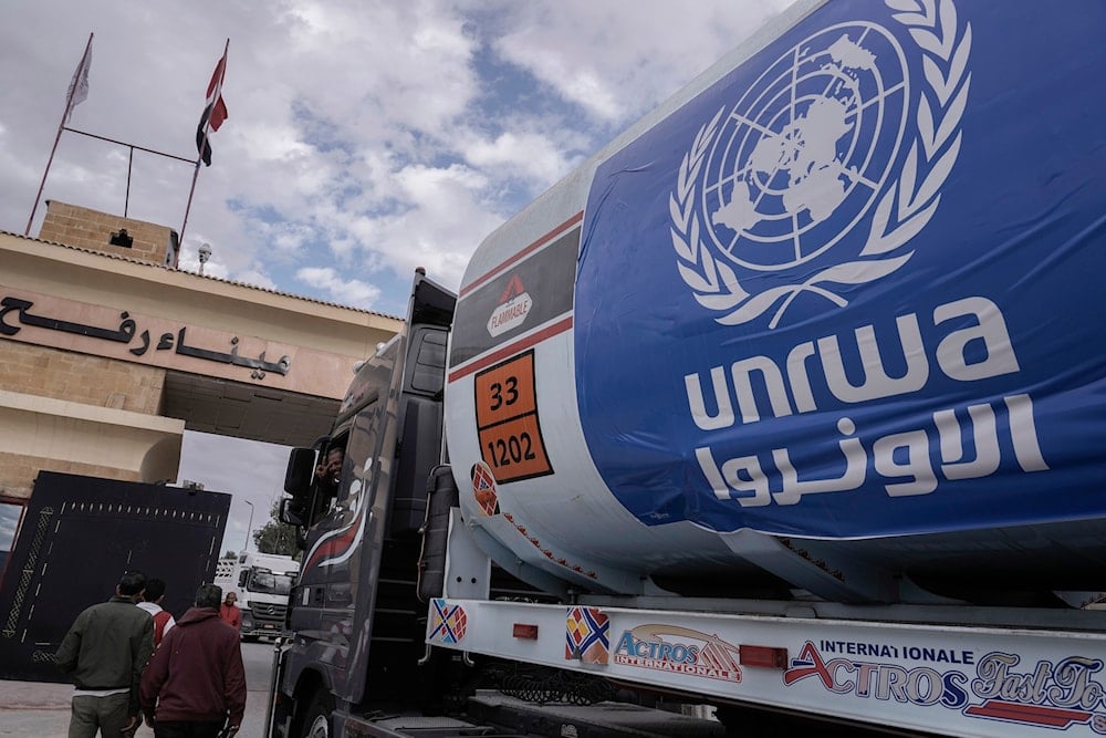 A truck carrying fuel crosses from Rafah, Egypt, to Gaza Sunday, Nov. 19, 2023. (AP)