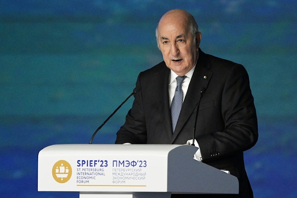 n this handout photo provided by Photo host Agency RIA Novosti, Algerian President Abdelmadjid Tebboune addresses a plenary session of the St. Petersburg International Economic Forum in St. Petersburg, Russia, June 16, 2023 (AP)