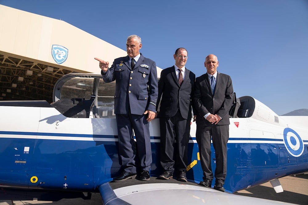 From left, Major Gen. Georgios Vagenas, commander of the Greek Air Force Training Command, Head of SIBAT Yair Kulas, President and CEO of Elbit Systems Bezhalel Machlis in Oct 2022 (AP)