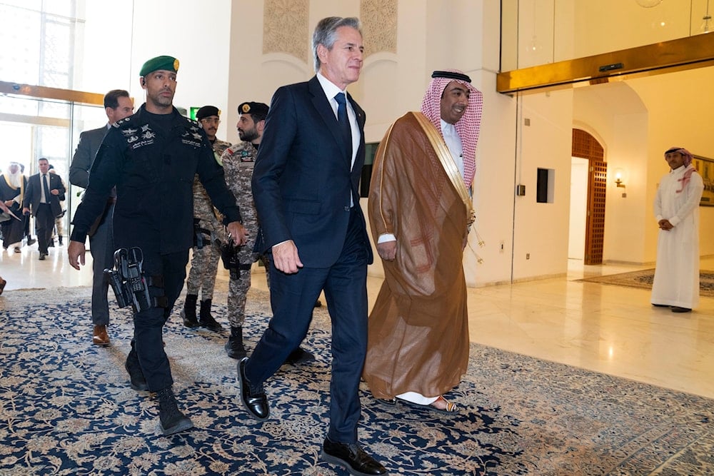 U.S. Secretary of State Antony Blinken, center, arrives to meet with Saudi Foreign Minister Prince Faisal bin Farhan, at the Ministry of Foreign Affairs in Riyadh, Saudi Arabia, Saturday Oct. 14, 2023. (AP)