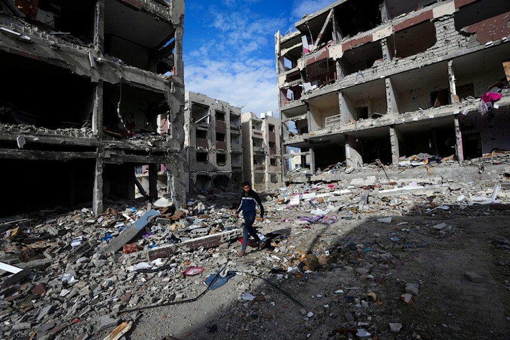 Palestinians visit their houses destroyed in the Israeli bombings southeast of the Gaza City on Tuesday, Nov. 28, 2023. on the fifth day of the temporary ceasefire between Hamas and Israel. (AP)