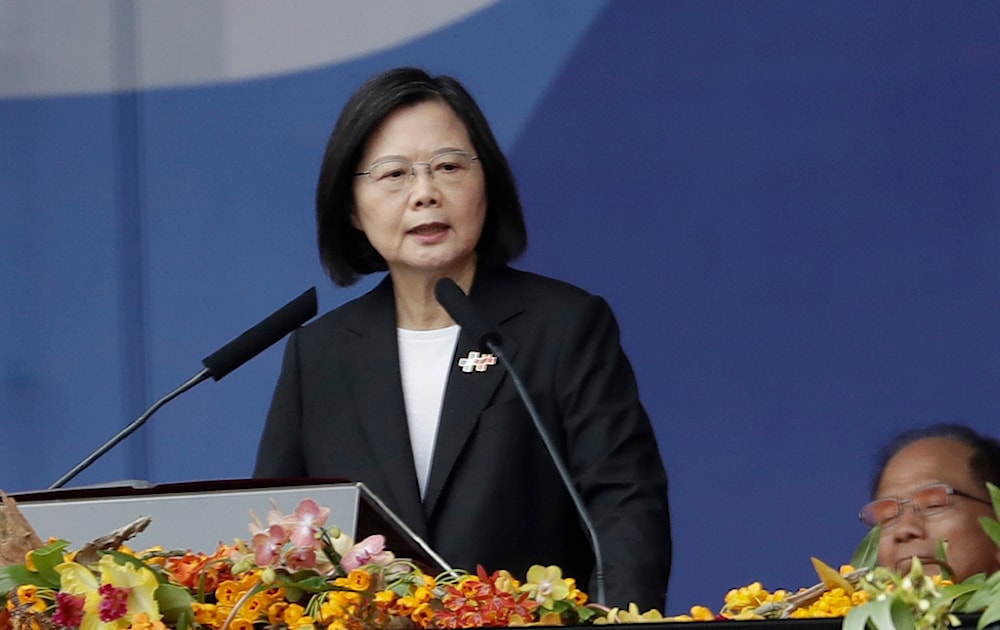 Taiwanese President Tsai Ing-wen delivers a speech during National Day celebrations in front of the Presidential Building in Taipei, Taiwan Tuesday, Oct. 10, 2023 (AP Photo/Chiang Ying-ying)
