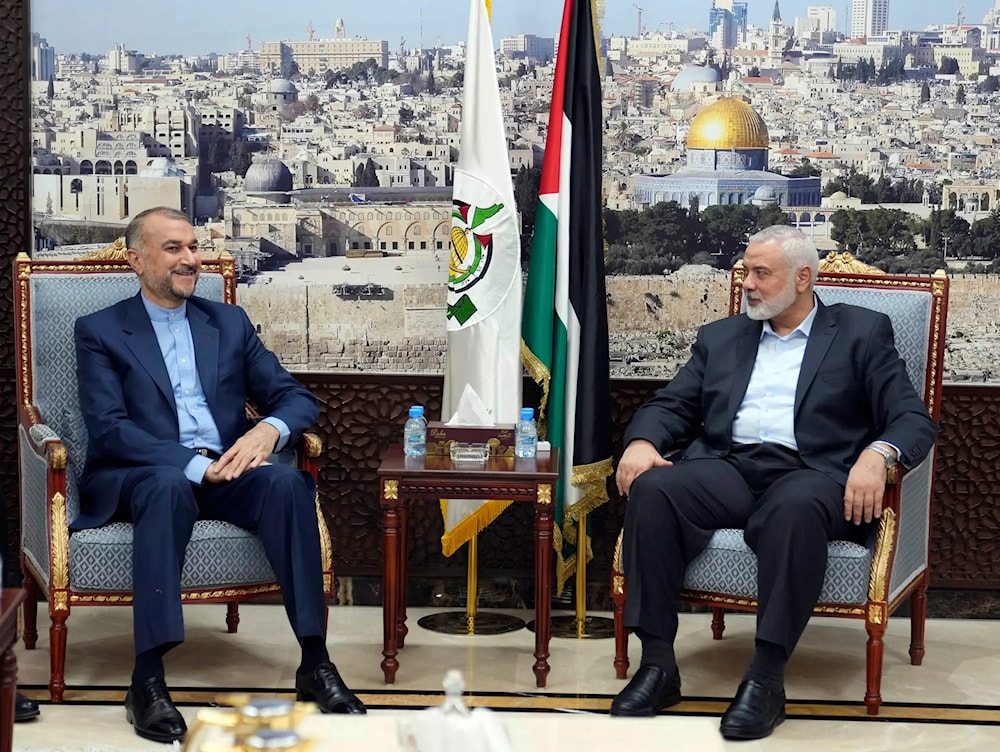 Iran's Foreign Minister Hossein Amirabdollahian, left, meets with Hamas chief Ismail Haniyeh in Doha, Qatar, Oct. 31, 2023. (Iranian Foreign Ministry/AP)