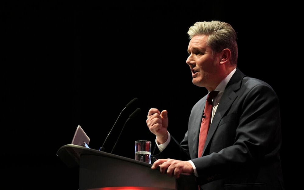 Keir Starmer, the leader of Britain's Labour Party, delivers a speech in Liverpool, England, September 27, 2022. (AP)