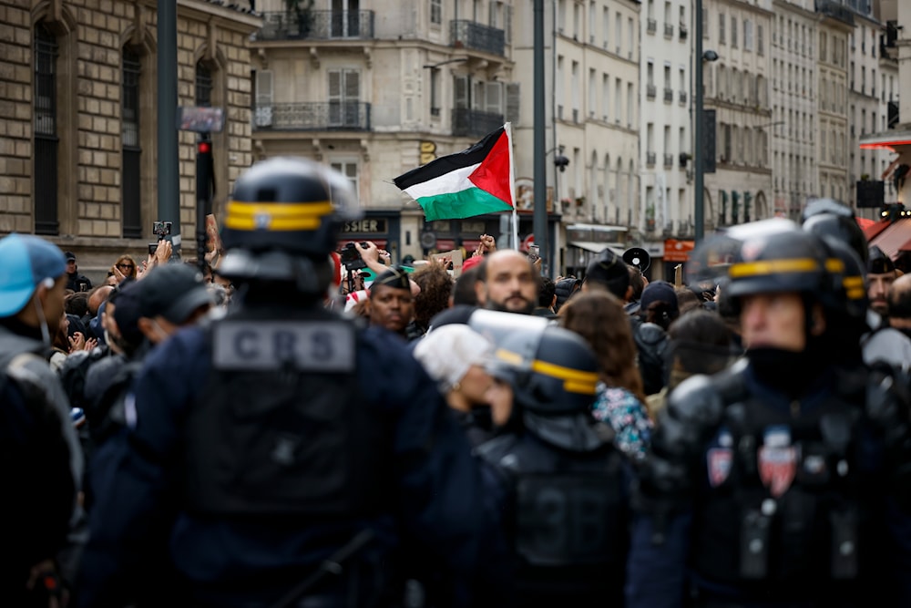 Protestors demonstrate during a rally in solidarity with the Palestinian people in Gaza, in Paris, Saturday Oct. 14, 2023. (AP)