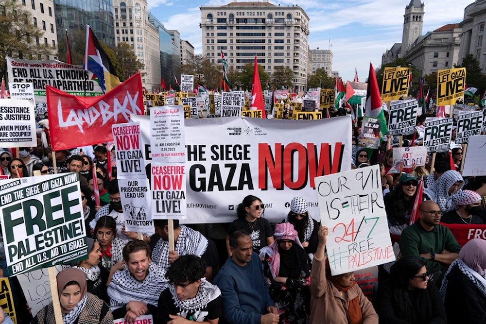 Anti-war activists rally during a pro-Palestinian demonstration asking to cease fire in Gaza, at Freedom Plaza in Washington, Saturday, Nov. 4, 2023 (AP Photo/Jose Luis Magana)