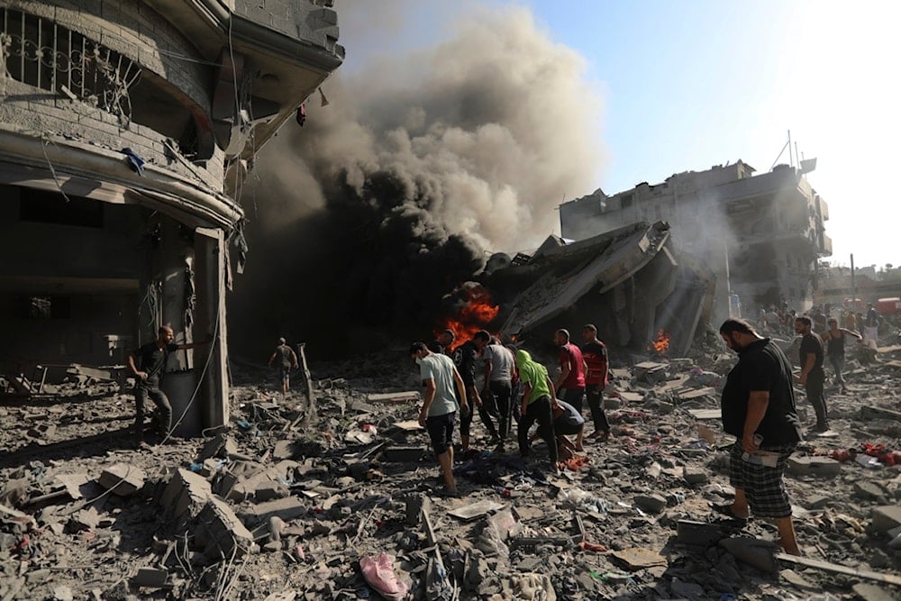 Palestinians inspect the damage of a house destroyed by an Israeli airstrike in Gaza City, Saturday, Nov. 4, 2023 (AP Photo/Abed Khaled)