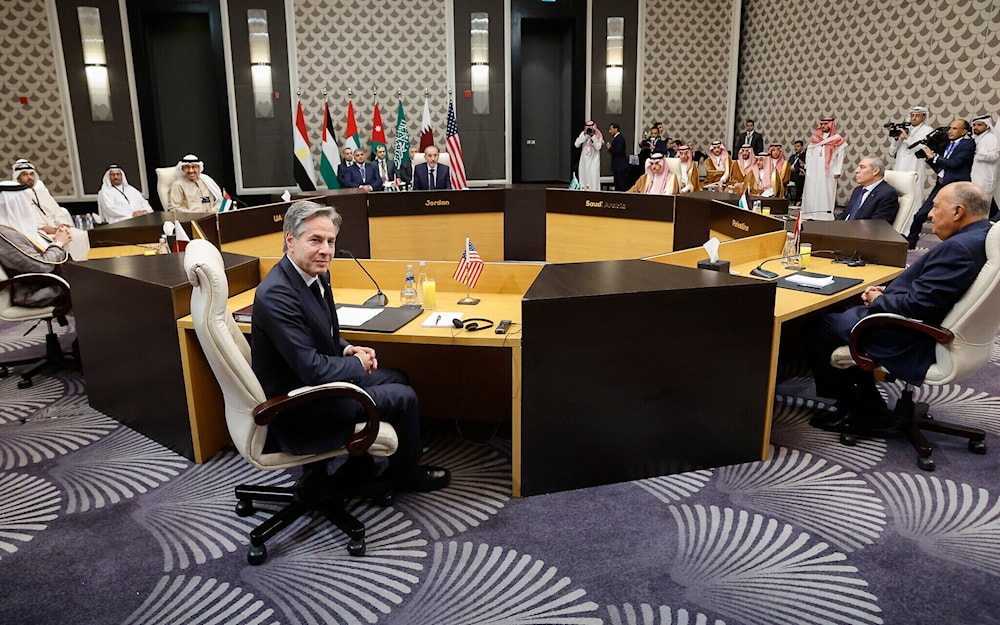 US Secretary of State Antony Blinken, front left, attends a meeting with Arab foreign ministers in Amman, Jordan, November 4, 2023 (AP)