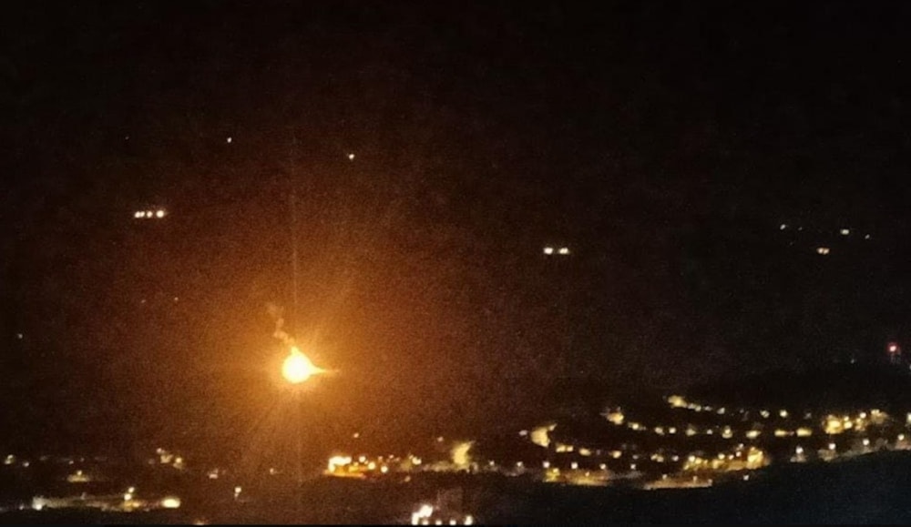 The occupation throws illuminating shells into the 'Metula' settlement airspace after targeting it. (Social media)